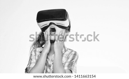 Virtual education for school pupil. Get virtual experience. Virtual reality concept. Girl cute child with head mounted display on white background. Small kid use modern technology virtual reality.