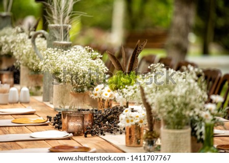 Details of the wedding ceremony held in the garden in the summer. Royalty-Free Stock Photo #1411707767