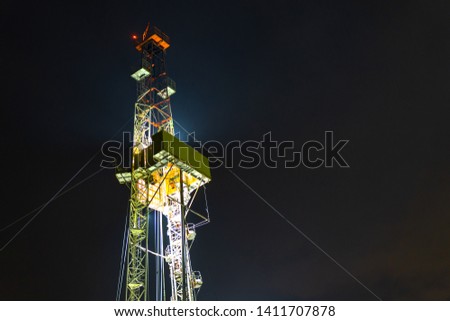 The beautiful sunrise landscape of Drilling rig in onshore oilfield of Russia. Oil drilling rig operation on the oil platform in oil and gas industry
