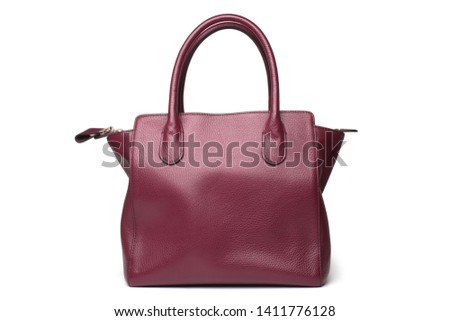Leather handbag on white background