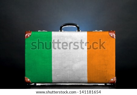 The irish flag on a suitcase for travel.