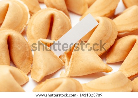 Chinese fortune cookies. Cookies pile with blank blank inside for words prediction. Isolated on white background
