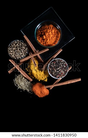 Spices collection assortment on black background - zenithal picture