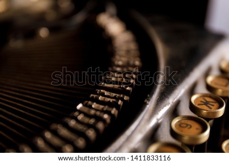 Antique Typewriter. Vintage Typewriter Machine Closeup Photo.