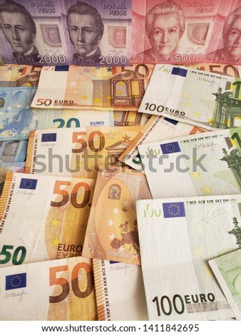 chilean banknotes and euro bills of different denominations 