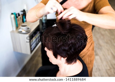 Mature woman at the hairdresser