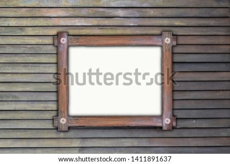 Empty wooden frame, hanging on wood panels background. Retro style design