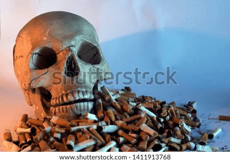 The human skull, the waste from the cigarette. Back and front of blur specially