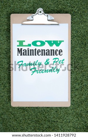 Artificial Grass Sign on synthetic lawn, turf