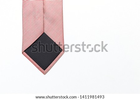 Back of red pattern necktie isolate on white background, business and men fashion background