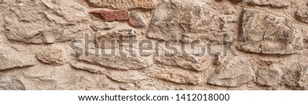 Stone texture and background. Rock texture. Panorama of masonry