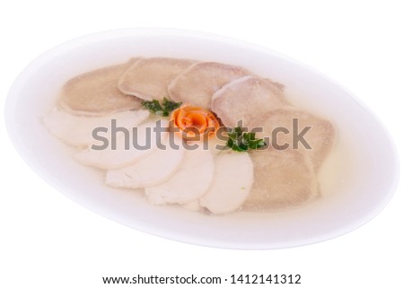 Jellied beef tongue in a white plate. Isolated