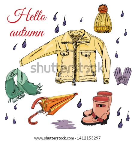 Set with hand drawn of items of autumn clothes and drops. Ink and colored sketch elements  isolated on white background.