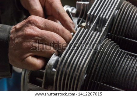 Motor repair. Aircraft engine reconditioning Royalty-Free Stock Photo #1412207015