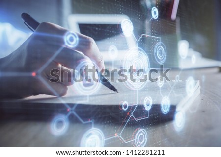 Multi exposure of woman's hands on background with technology and digital coding icons. Data development concept.