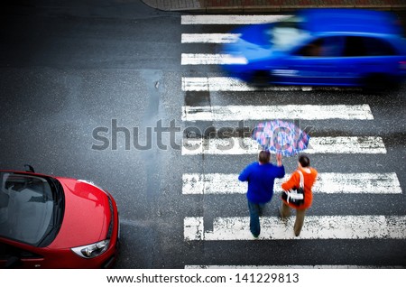 pedestrian crossing with car Royalty-Free Stock Photo #141229813