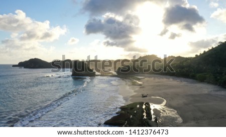 the beauty of the island on the beach, malang indonesia Royalty-Free Stock Photo #1412376473
