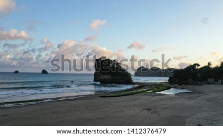 the beauty of the island on the beach, malang indonesia Royalty-Free Stock Photo #1412376479