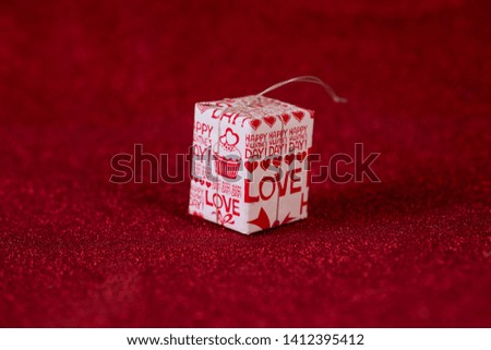 Red background image and gift box Valentine's Day concept