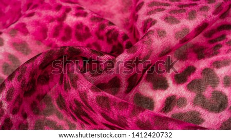 Background texture. leopard silk bright fabric african themes
