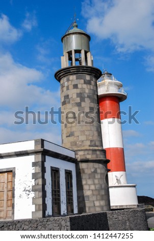 lighthouse on background of blue sky, digital photo picture as a background