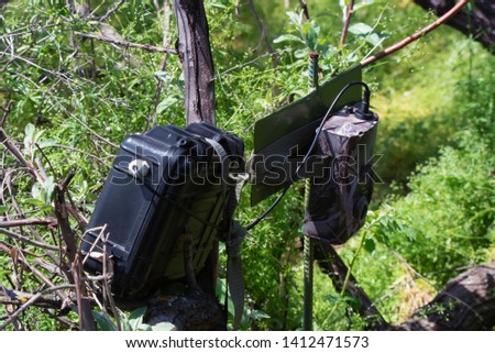 Camera trap on tree for pictures of animals