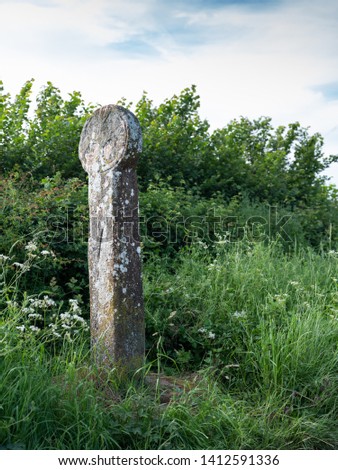 The Buttercross, Alveley, Shropshire.  A medieval standing stone cross situated on the crossroads at the back of the village.