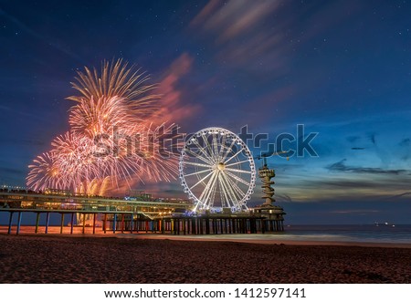 Fireworks festival at the north sea pier in Scheveningen                 Royalty-Free Stock Photo #1412597141