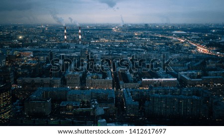 City day turn to night. Shot from viewpoint in skyscraper in Moscow City