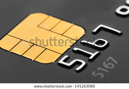 Closeup of credit card micro chip Royalty-Free Stock Photo #141263080