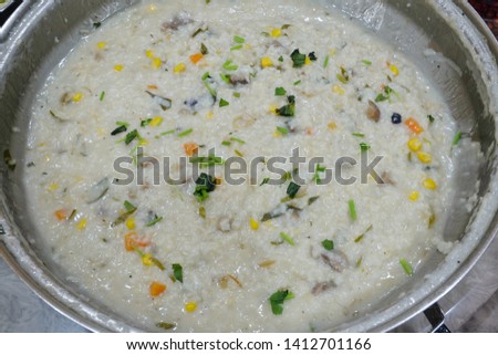 A picture of one homemade pot of "bubur lambuk" or porridge serve for breaking fast.