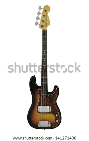 Vintage Electric Bass guitar isolated over a white background Royalty-Free Stock Photo #141271438