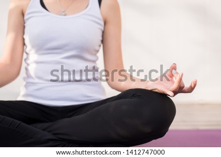 Close up of hands women practices yoga and meditation on the lotus posture,Close up