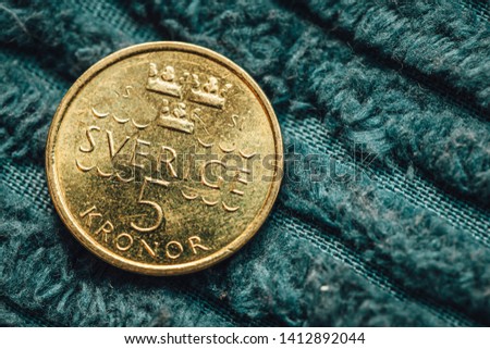 5 Swedish krona coin in macro view  Royalty-Free Stock Photo #1412892044