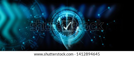 Hand working with Standard Quality Control Certification Assurance Guarantee Internet Business Technology Ui. Royalty-Free Stock Photo #1412894645