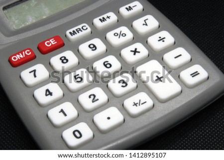 Vintage calculating tool. Calculator office tool. Old calculator.