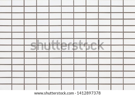 White brick stone wall texture and seamless background