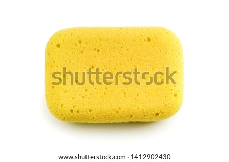 Yellow sponge isolated on the white background. Top view Royalty-Free Stock Photo #1412902430