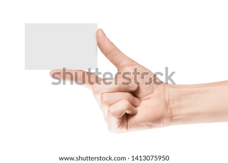 Hand holding a blank card or a ticket/flyer, isolated on white background