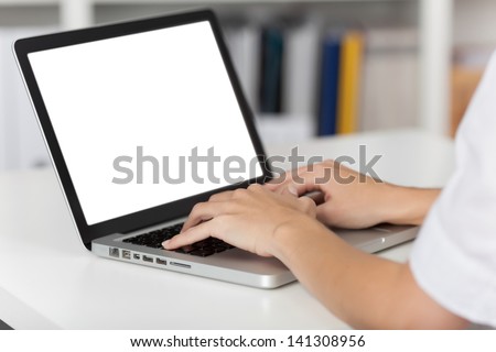 Rear view of business woman hands busy using laptop at office desk, with copyspace Royalty-Free Stock Photo #141308956