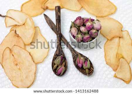 Photo of tea made from buds of roses and dried fruits