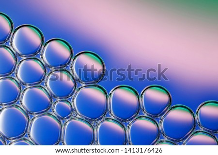 Soap bubbles with colorful background.