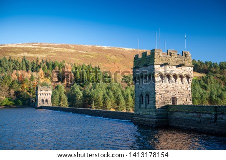 View of Derwent Dam and Reservoir, Peak District National Park, Derbyshire, UK. Derwent Reservoir is the middle of three reservoirs in the Upper Derwent Valley in the north-east of Derbyshire, England Royalty-Free Stock Photo #1413178154