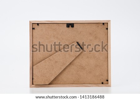 Blank wooden photo frame isolated