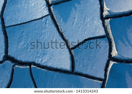 
blue cracked earth, dry soil
