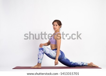 Portrait of asia woman practicing yoga indoor.Calmness and relax, female happiness,isolated background