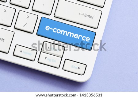 E-Commerce - keyboard with word on blue key