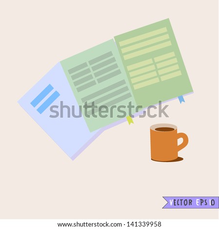 Coffee cup and notebook