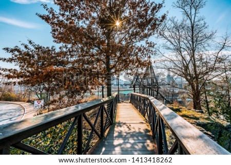 Philadelphia, Pennsylvania, USA - December, 2018 - Walking on a beautiful bridge at Fairmount Water Works Garden, Philadelphia Art Museum.