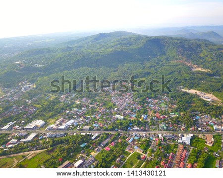 over view image from drone flight  over countryside at southern Thailand background.